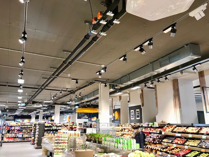 Innenansicht Supermarkt im Neubau Wormser Hof Heidelberg